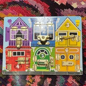 Melissa & Doug Vibrant Latches Learning Board
